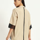 Vanilla beige shirt with floral embroidery and knitted sleeve details