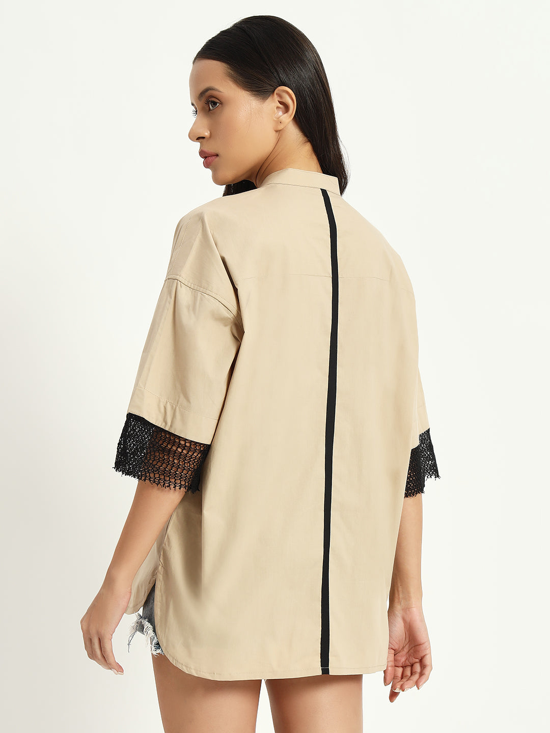 Vanilla beige shirt with floral embroidery and knitted sleeve details