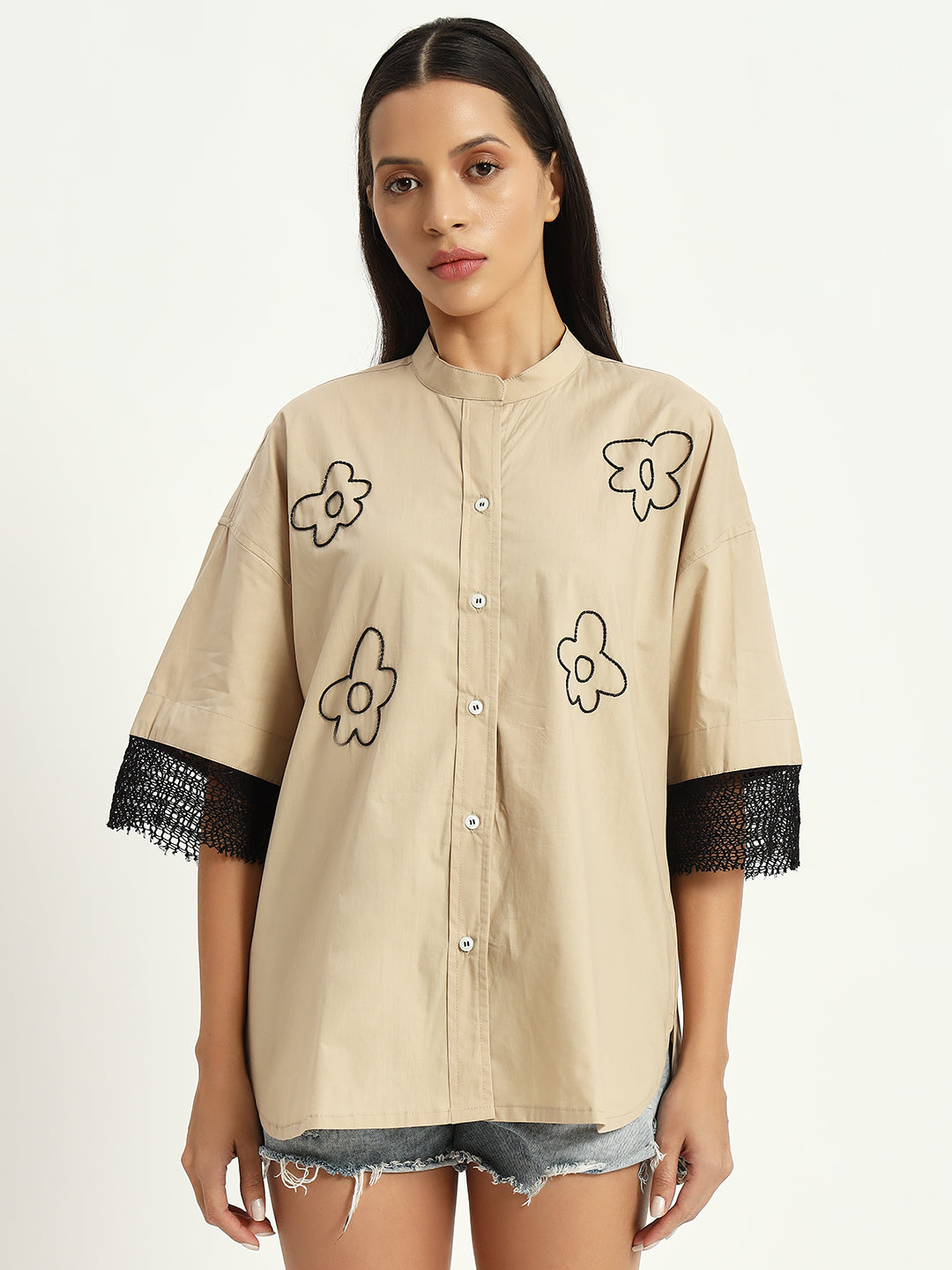 Vanilla beige shirt with floral embroidery and knitted sleeve details
